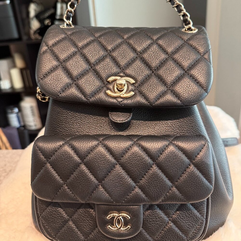 Black Quilted Leather Backpack with Gold Hardware